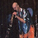 Playing didgeridoo on stage at Health and Harmony 2000.